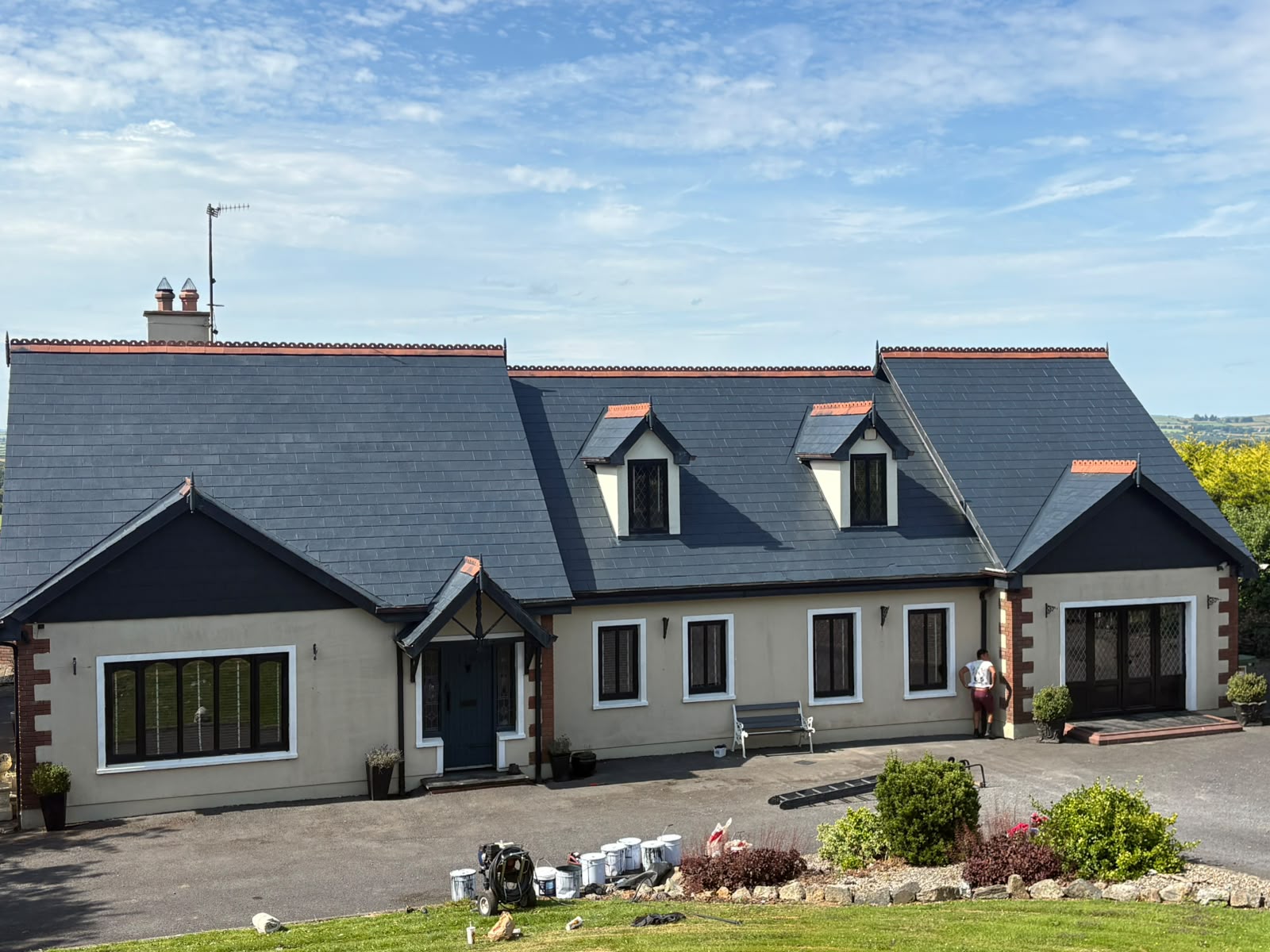Roof painting result on Waterford home